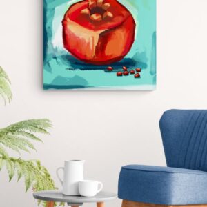 pomegranate canvas print with blue armchair